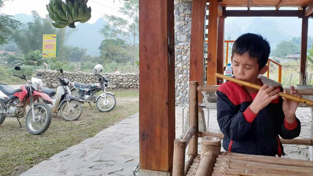 Northern Loop Boy Playing Flute Mountain View Homestay